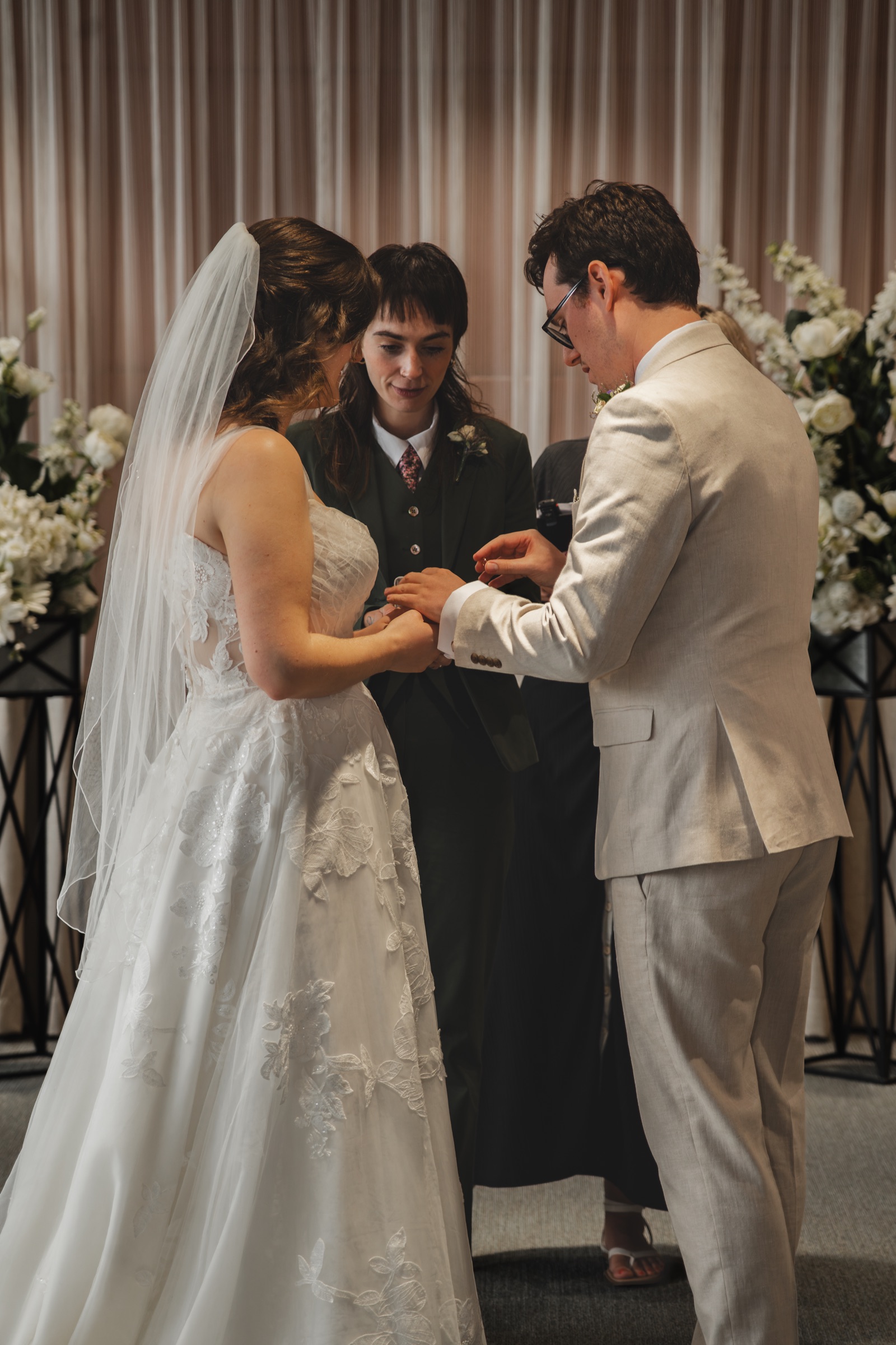 Ben and Tiffany with their celebrant during the wedding ceremony