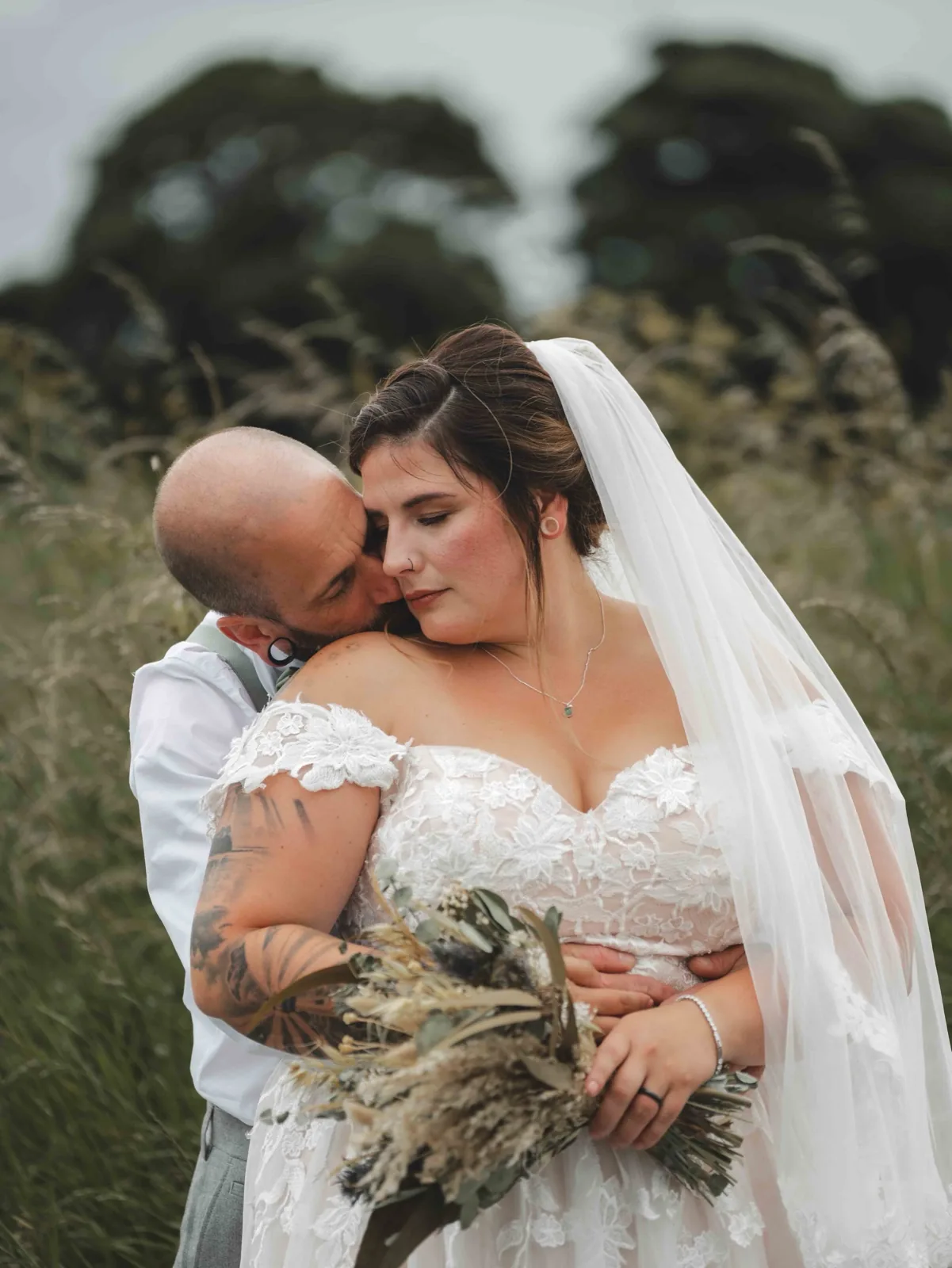 Candid wedding photograph of the couple