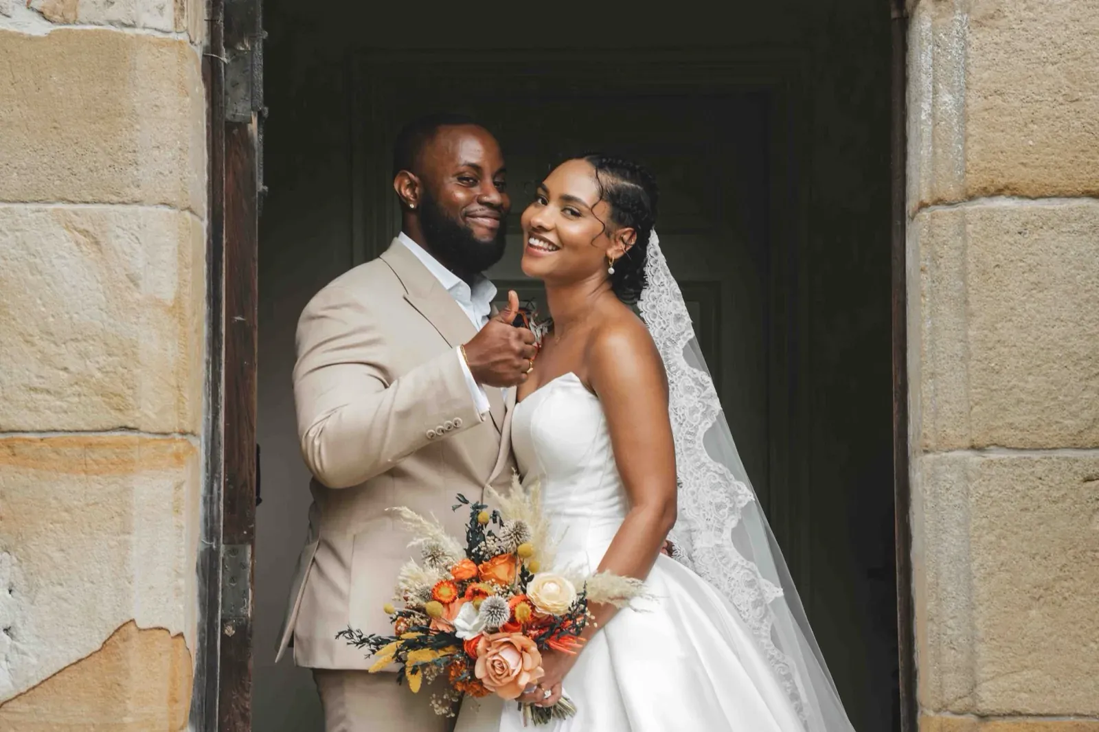 Jas and Greg celebrating at their Newcastle wedding